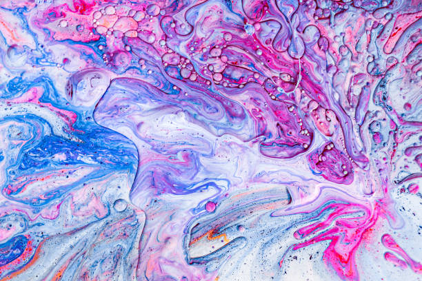 istock Abstract background with acrylic liquid textures. Modern artwork with spots and splashes of color paint. Applicable for into coffee packaging, labels, business cards, and interactive web backgrounds 1061591112