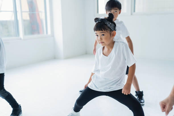 little hiphop dancer dancing at dance studio. - japanese girl imagens e fotografias de stock