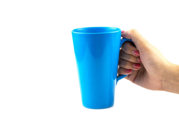istock Woman Hand with blue cup of tea isolated 1061600636