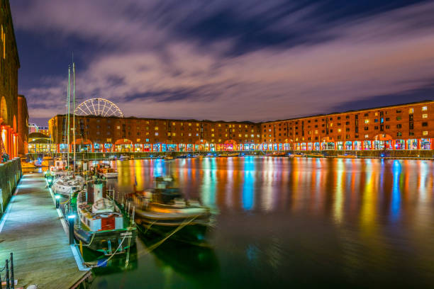 istock Night view of illuminated albert dock in Liverpool, England 1061608796