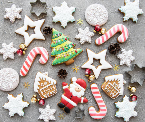 Christmas homemade gingerbread cookies Christmas homemade gingerbread cookies on a concrete background Christmas Tree Cookie stock pictures, royalty-free photos & images