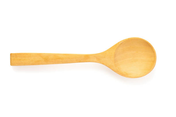 istock Wooden spoon isolated on a white background 1061615198