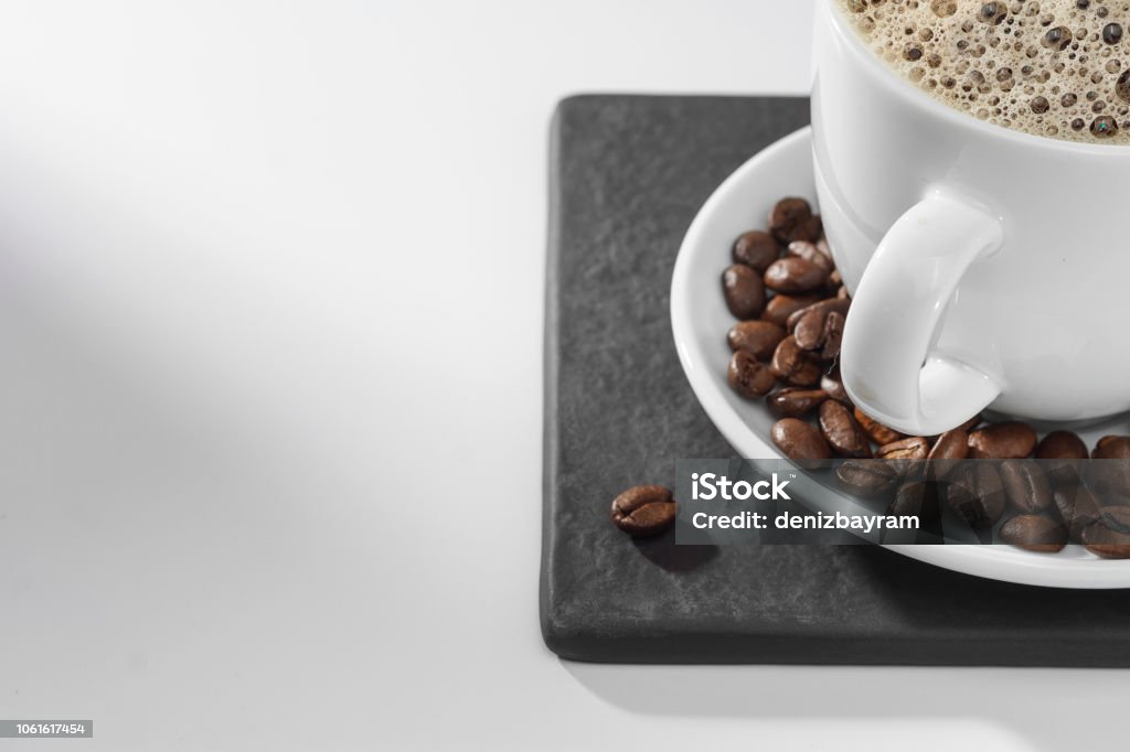 Coffee cup concept Coffee cup and coffee beans with copy space Bean Stock Photo