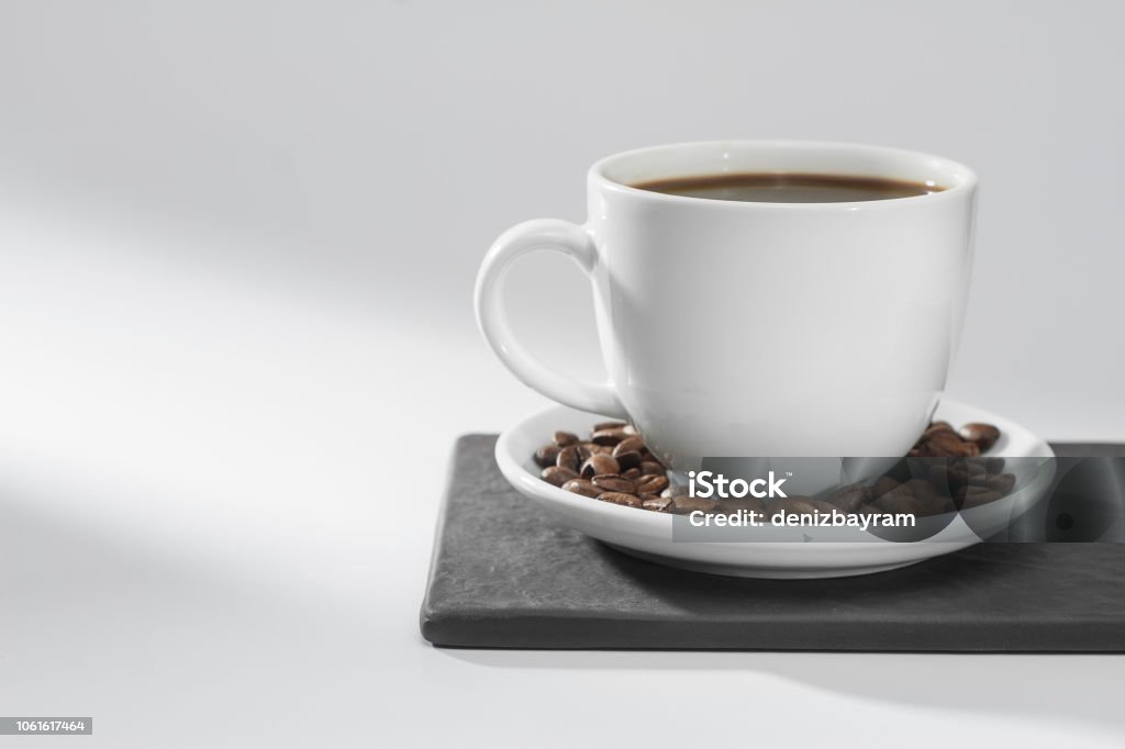 Coffee cup concept Coffee cup and coffee beans with copy space Bean Stock Photo