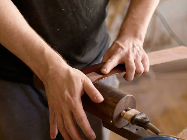 istock The process of making a cutaway on a classical guitar. 1061618224