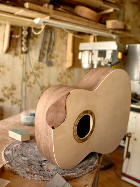 istock The process of making a cutaway on a classical guitar. 1061618378