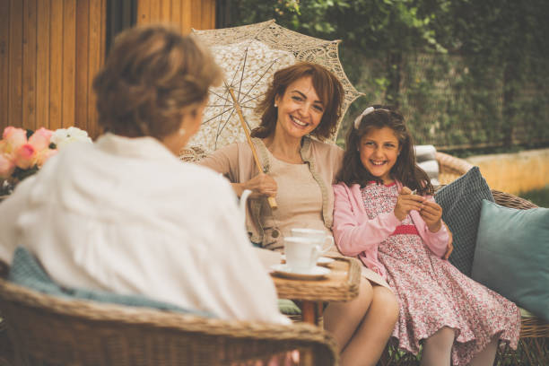 istock Woman relaxing with family 1061622078