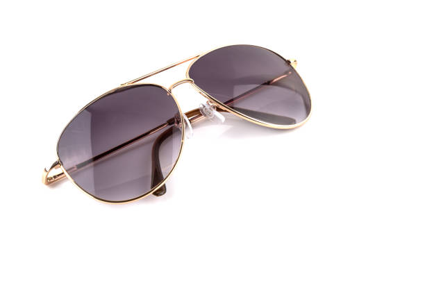 istock Pink gold Elegant sunglasses isolated on  white 1061622954