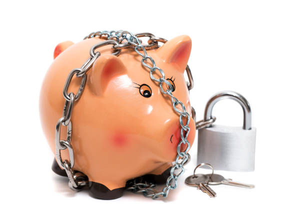 istock Cute piggy bank with lock 1061623010