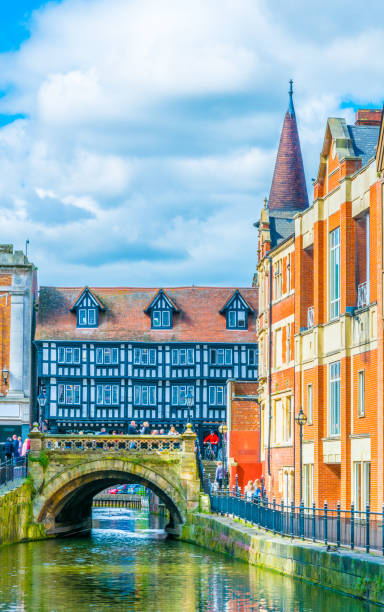 istock River Witham passes old brick buildings in central Lincoln, England 1061625308