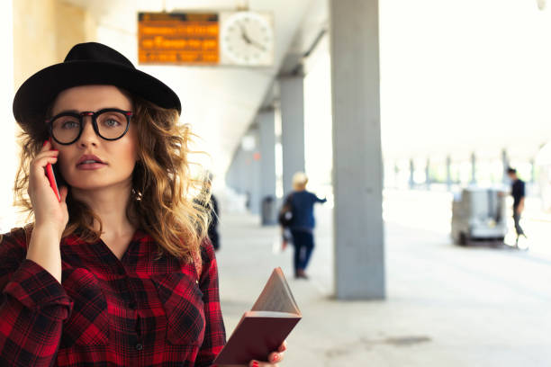 istock Woman in a train station 1061630266