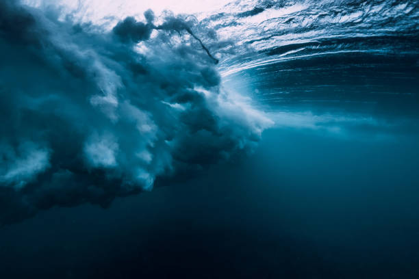 istock Barrel wave underwater with air bubbles. Ocean in underwater 1061638006