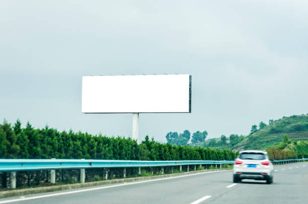 istock Blank billboard on blue sky background for new advertisement 1061638748