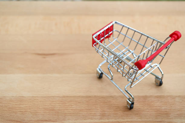 istock trolley on wooden with copy space using as business background 1061642738
