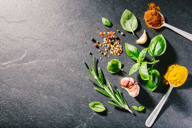 istock Ingredients for cooking placed on dark background. 1061642874