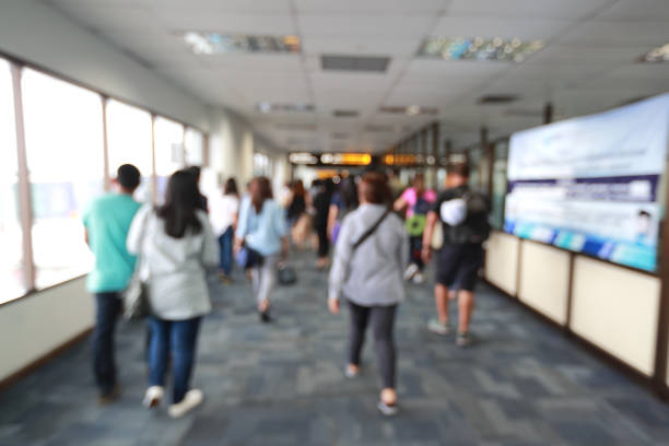 istock blur image of passengers in airport terminal 1061645192