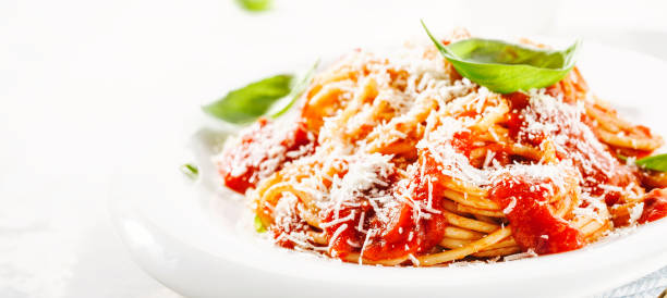 istock Pasta with tomato sauce and parmesan 1061645504