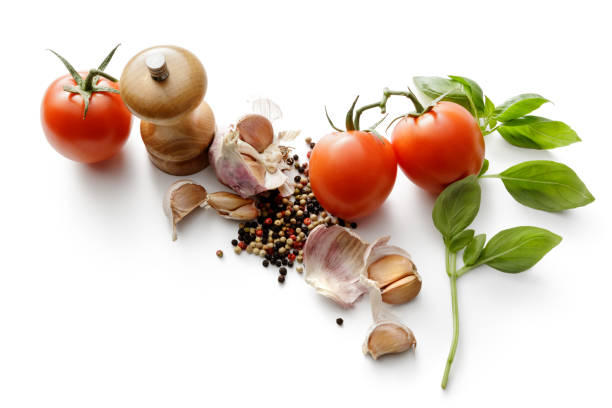 istock Ingredients: Tomatoes, Basil, Garlic and Pepper Isolated on White Background 1061648054