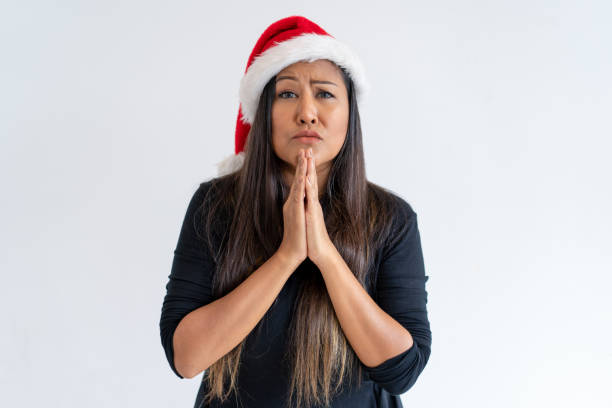 istock Worried Christmas lady begging for help 1061655582