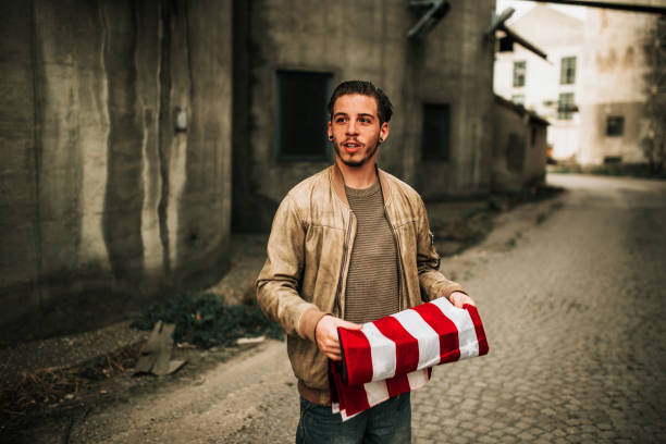 istock Man with American Flag 1061658388