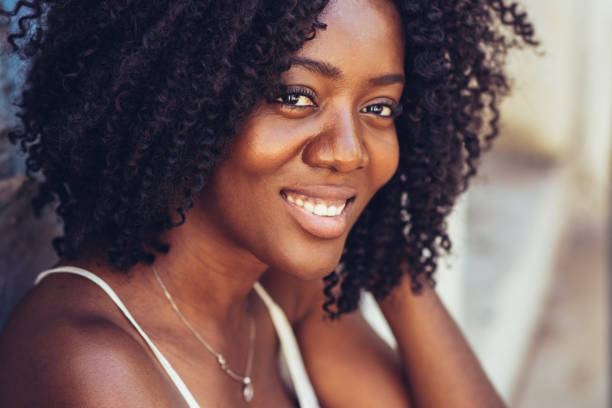 istock Smiling young attractive black woman looking at camera 1061659894
