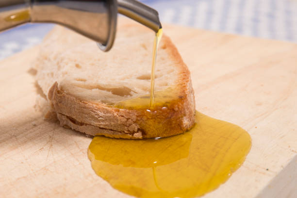 istock Olive oil on traditional bread 1061660104