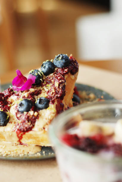 istock Waffle with fruits in a cafe closeup 1061661414