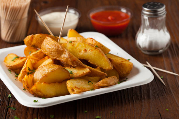 istock Traditional Spanish baked potato with hot pepper chili. 1061661856
