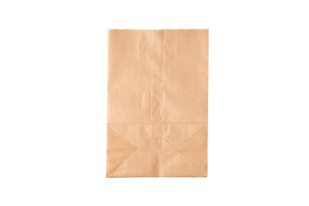 New kraft paper bag laying flat  isolated on white background .