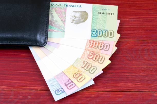 istock Angolan money in the black wallet 1061668322