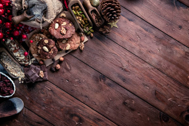 istock Ingredients for chocolate and nuts cookie making with frame for copy space. Christmas themes. 1061670800