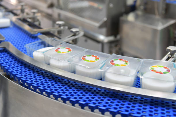 istock Food products boxs transfer on Automated conveyor systems 1061673522