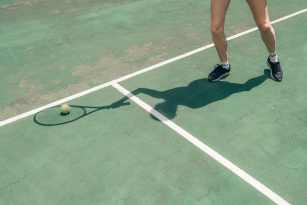 Shadow of tennis player