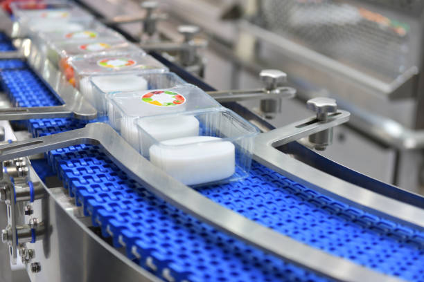 istock Food products boxs transfer on Automated conveyor systems 1061674472