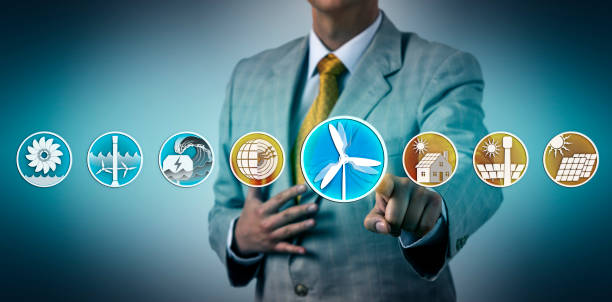 istock Man Selecting Wind Power In Lineup Of Renewables 1061676864