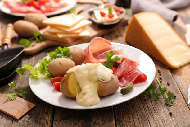 istock raclette cheese with meat and potato 1061677080