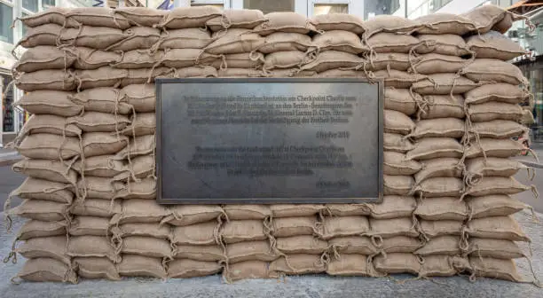 Photo of Historic plaque, checkpoint Charlie in Berlin, Germany