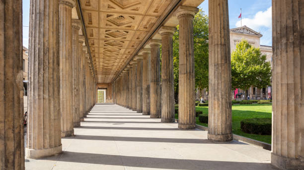 istock Colonnade pillars in Berlin, Germany, low angle 1061679044