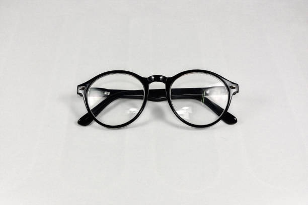 istock Reading glasses on a white background. 1061679838