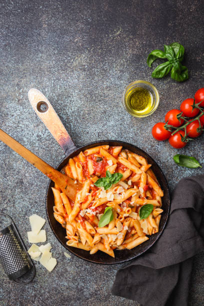 istock Penne pasta in tomato sauce 1061690342