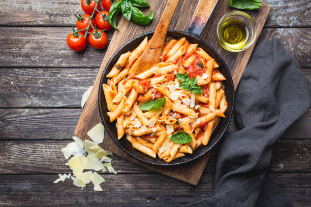 istock Penne pasta in tomato sauce 1061690356