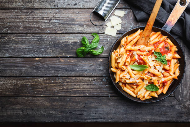 istock Penne pasta in tomato sauce 1061690358
