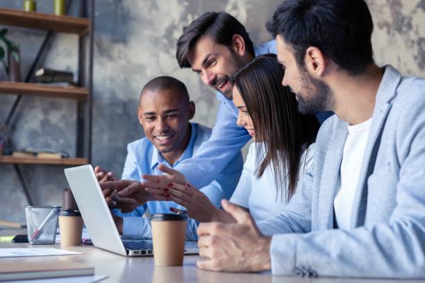 istock Full concentration at work. Corporate team working colleagues working in modern office. 1061693258