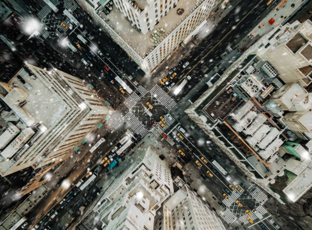 Aerial view of fifth avenue snowing Aerial view of fifth avenue snowing midtown manhattan photos stock pictures, royalty-free photos & images