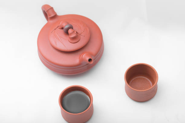 teapot and cup isolated on white background
