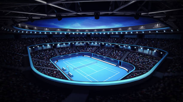 illuminated tennis stadium with court and evening sky