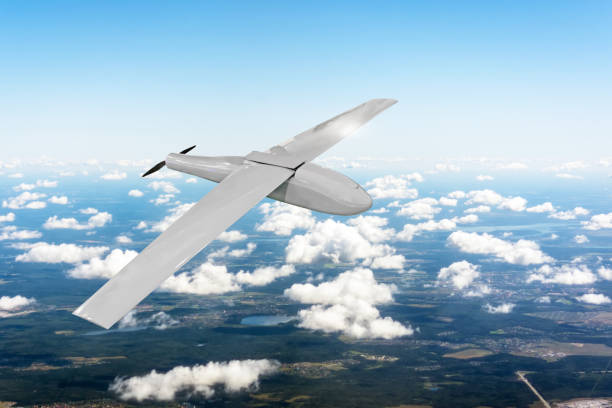 istock Patrolling unmanned aircraft in the sky above the terrain, fly tracking. 1061700848