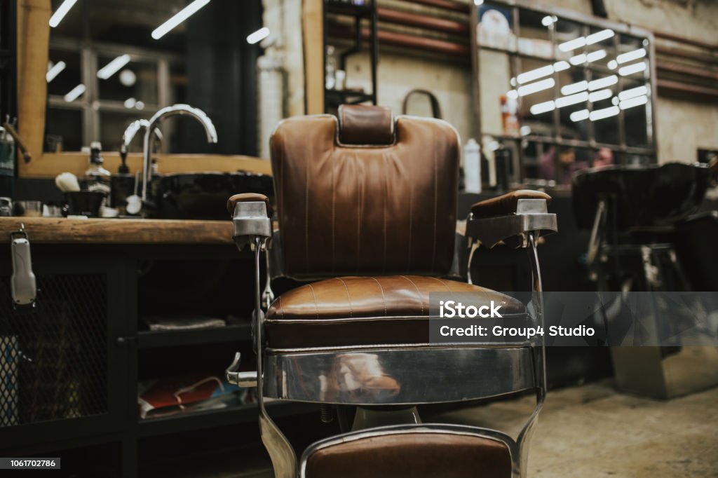 Barber shop Old vintage chair in barber shop. Barber Shop Stock Photo
