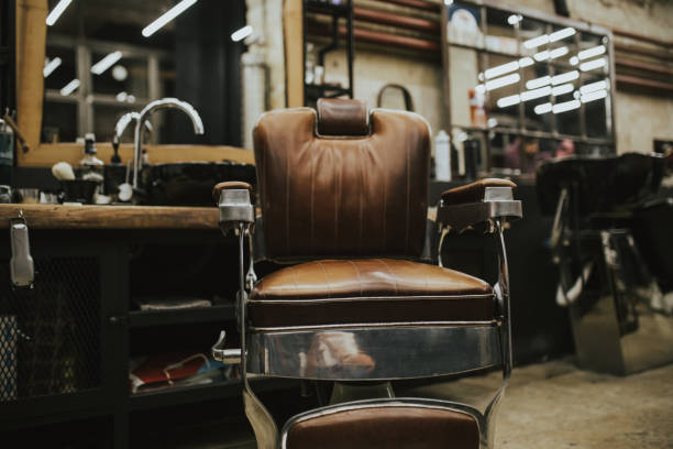Barber shop Old vintage chair in barber shop. barber shop stock pictures, royalty-free photos & images