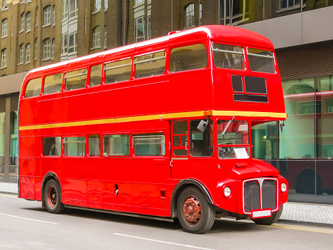 Road Traffic in London. Red Double Decker Bus on the street of London, United Kingdom